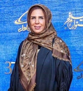 الهام غفوری در جشنواره فیلم فجر با روسری قهوه ای و مانتو مشکی